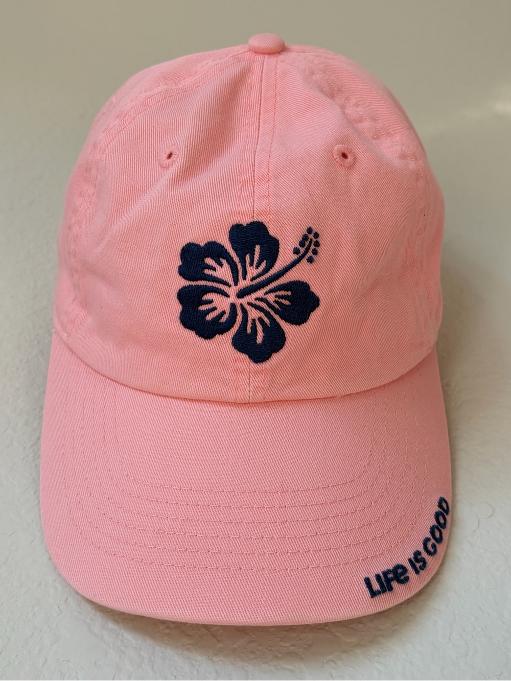 Life is Good Embroidered Hibiscus Chill Cap Pink With Navy Blue Flower Logo